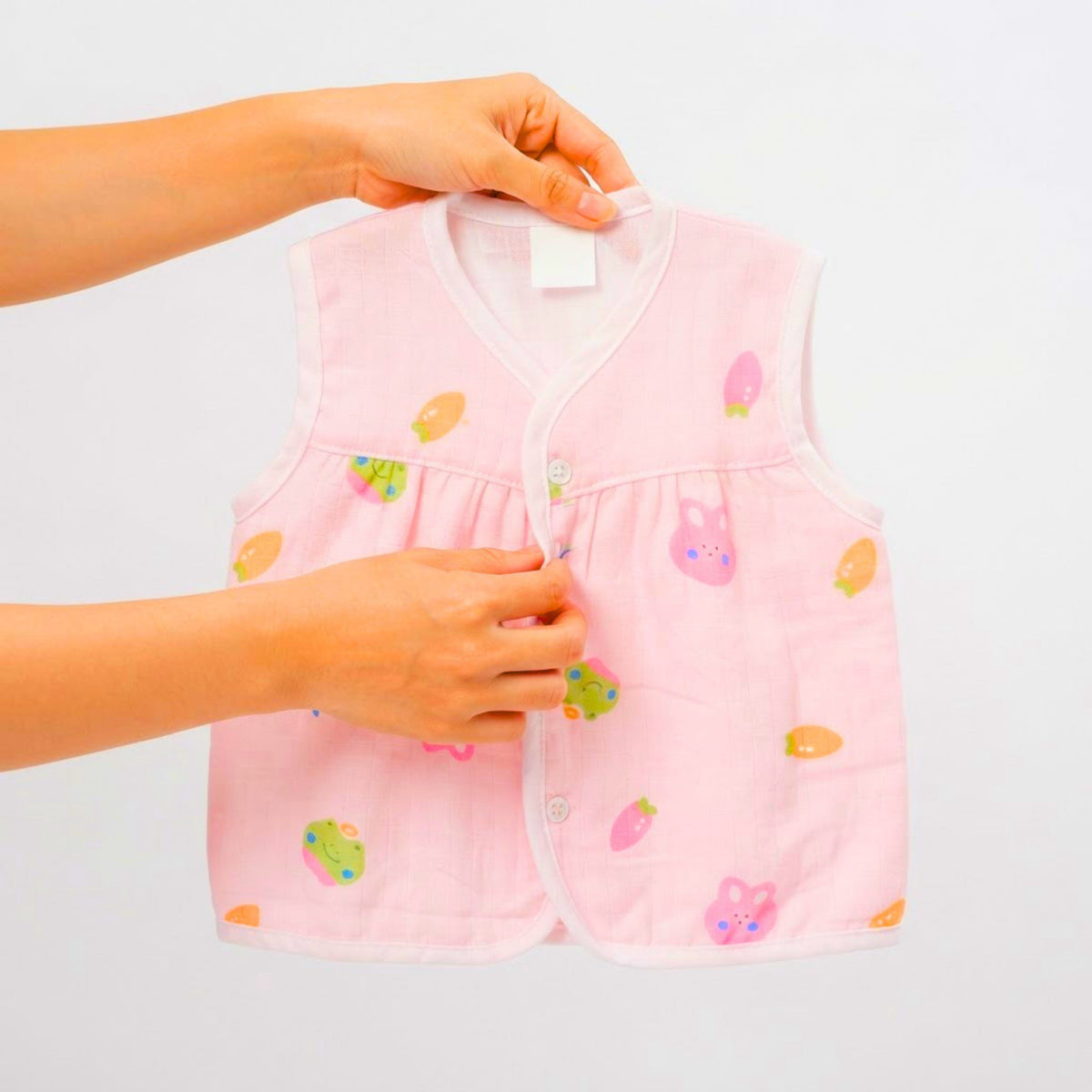 Lil’ Shark – Front-button opening on the pink muslin frock jhabla