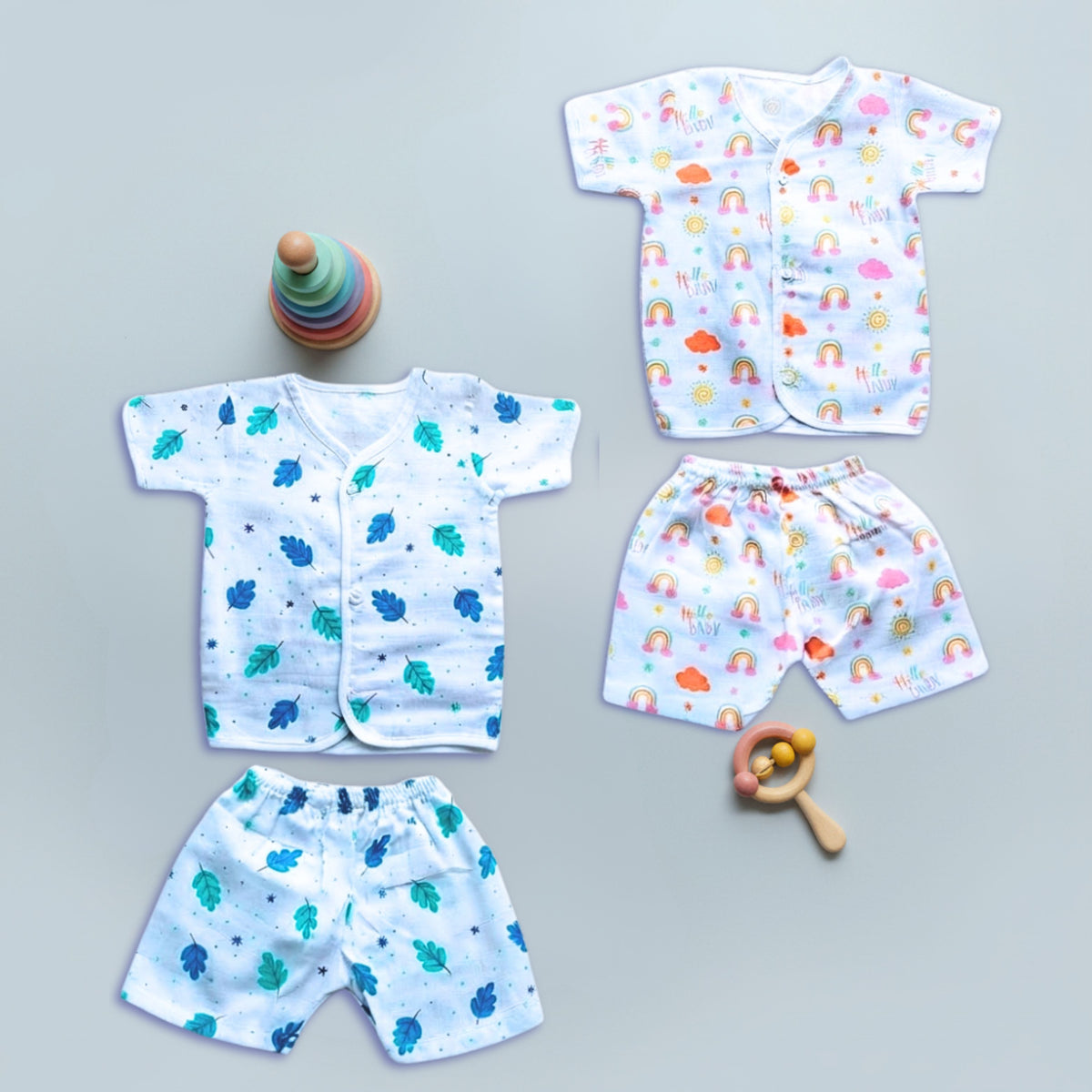 Two printed muslin front-open half-sleeve tops with matching shorts